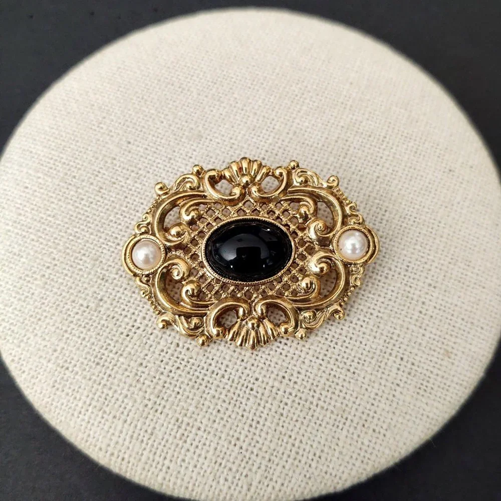 Vintage gold, black and faux pearl brooch